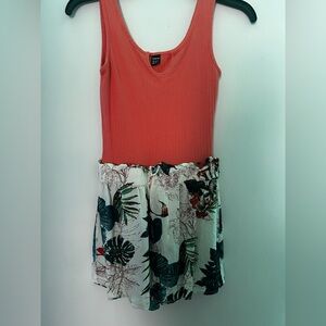This is an orange and floral print romper from SHEIN that is a size extra small.